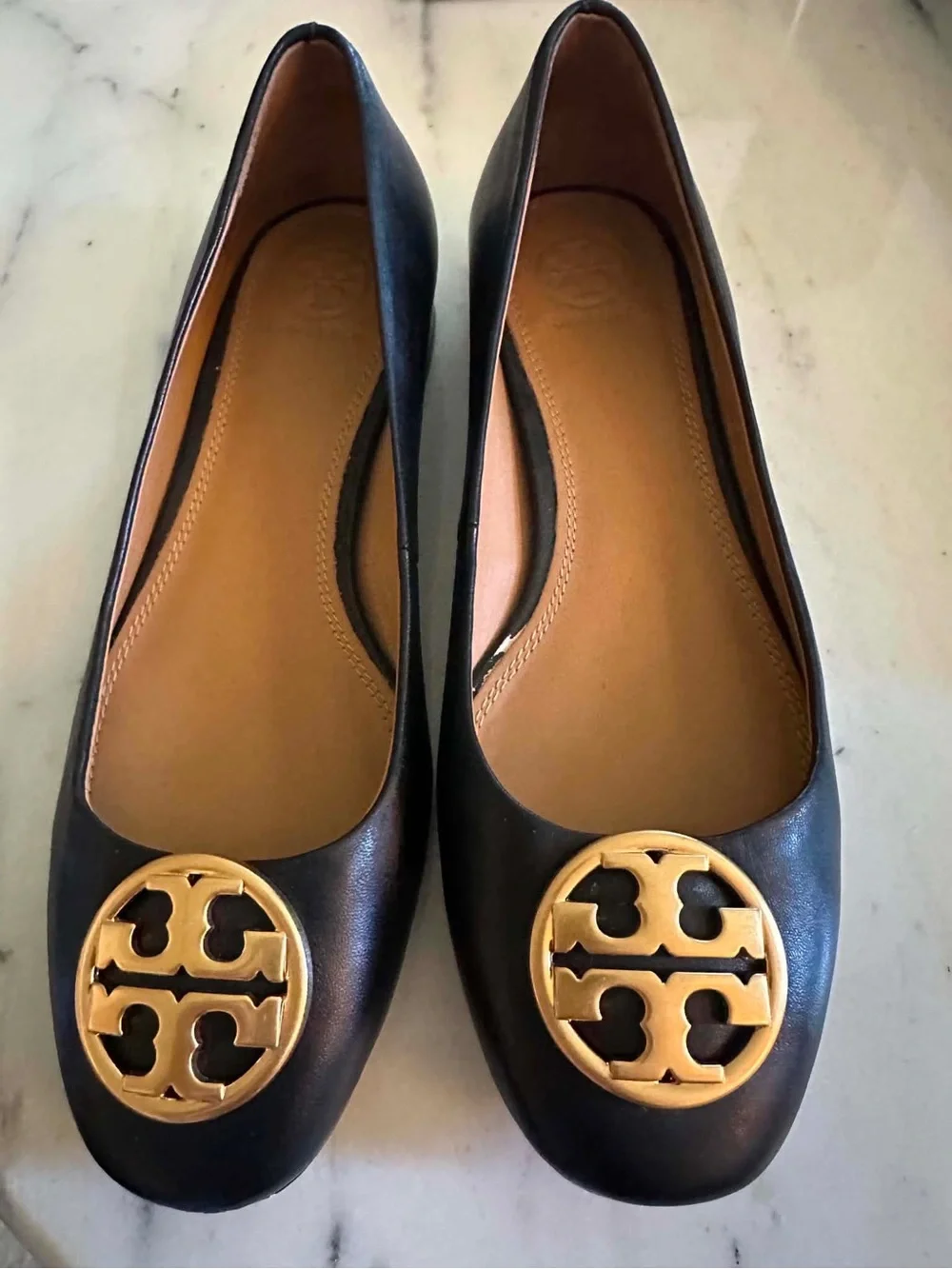 Tory Burch Black Leather Flats with Gold Logo  Contact me at: 985-758-9360